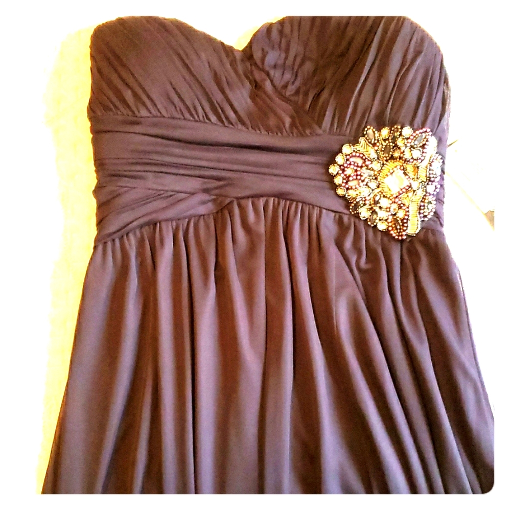 Navy strapless formal gown.